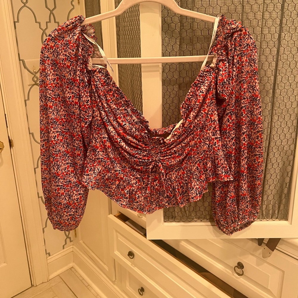 Lovers and Friends top, size medium but can fit a small also